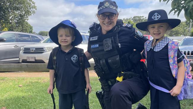 Darling Downs Highway Patrol Senior Sergeant Kim Hill with Middle Ridge State School students Lillian and Harvey Willis.