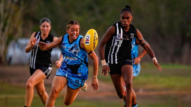 Marika Carlton and Ella Fitz chase the ball during their Round 3 WPL clash. Picture: Celina Whan / AFLNT Media.