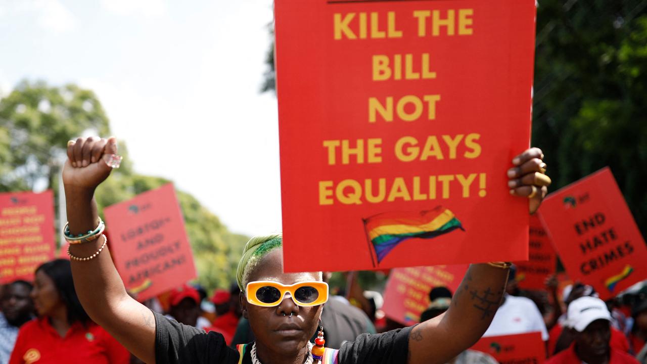 Queer activist Papa De raises her fist outside the Uganda High Commission in Pretoria during a picket against the country’s anti-homosexuality bill. Picture: Phill Magakoe/AFP