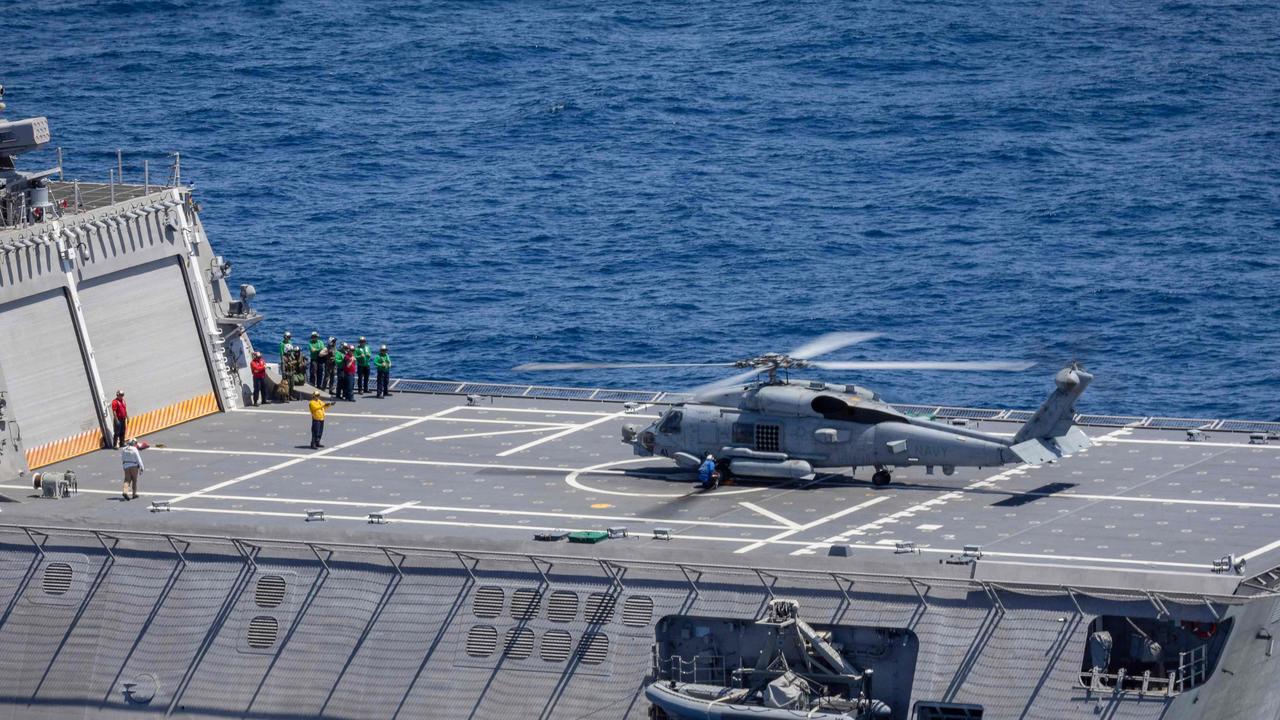 A US Navy Sikorsky MH-60R Seahawk helicopter on the flight deck of the USS Mobile during a multilateral maritime cooperative activity between Australia, the United States, Japan and the Philippines. Picture: AFP