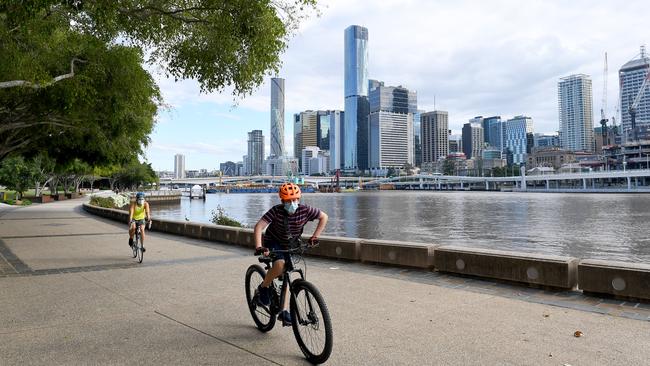 People are seen doing their early morning exercise on Tuesday in Brisbane amid the latest lockdown. Picture: Getty Images