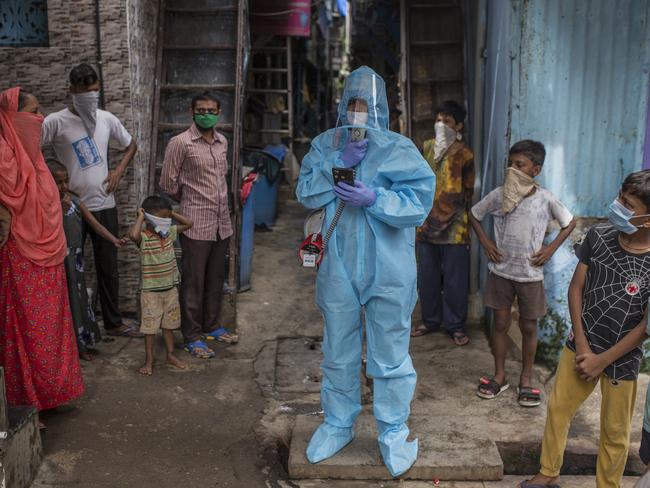 Muhammad Yunus, 32, in PPE, co-ordinator for the Covid-19 awareness program in Mumbai, India. Picture: UNICEF