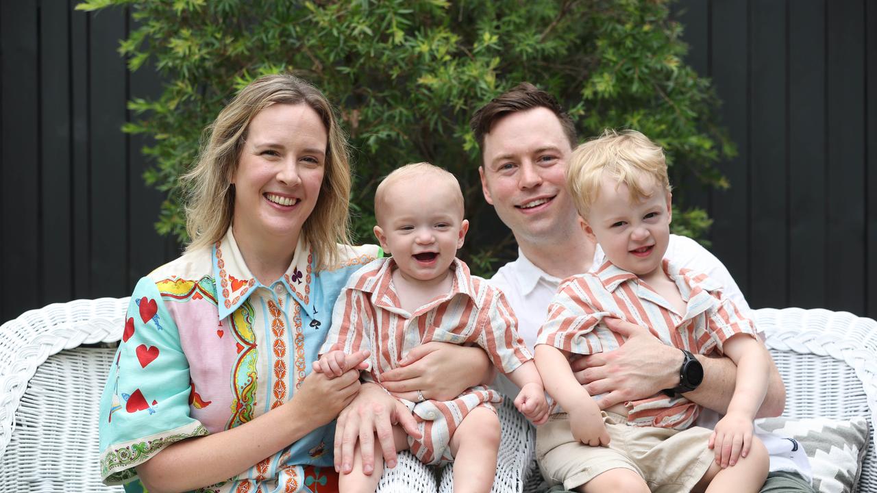 Dr Timothy &amp; Chelsea Beckman with sons Emrys, 12 months, after Craniofacial surgery and brother Harry, 3. Picture: Annette Dew