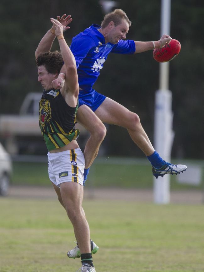 Colin McVeigh from Hastings leaps high.