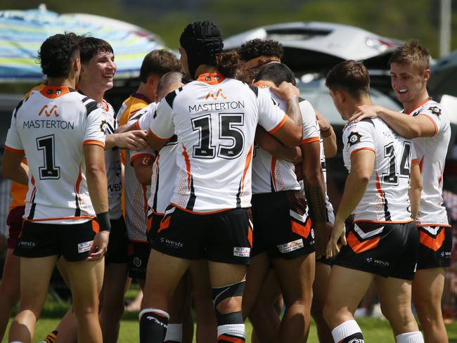 Tigers celebrate a try. DALEY Cup Rd 1 at Kirkham Oval Macarthur Wests Tigers vs Riverina Bulls Camden Valley Wy, Elderslie NSW 2570, Australia,Picture Warren Gannon Photography