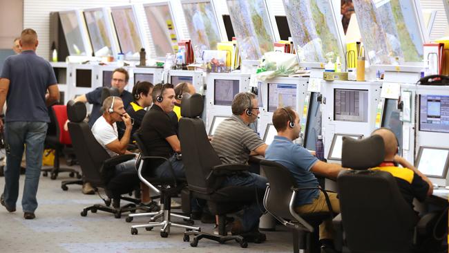 Air traffic controllers at work in the Brisbane operations centre. Picture: Lyndon Mechielsen