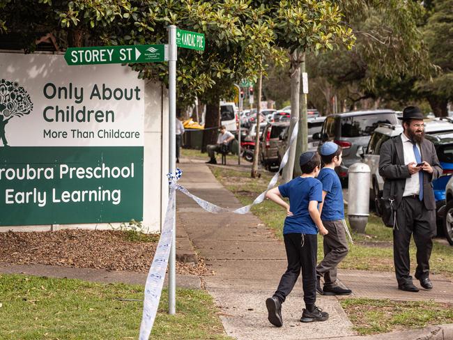 Members of the local Jewish community in the southern Sydney suburb of Maroubra arrive with their children at the childcare centre which last night was firebombed  in an anti-Semitic attack Picture: Julian Andrews