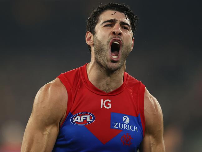 MELBOURNE, AUSTRALIA – MAY 09: Christian Petracca of the Demons celebrates after scoring a goal during the round nine AFL match between Carlton Blues and Melbourne Demons at Melbourne Cricket Ground, on May 09, 2024, in Melbourne, Australia. (Photo by Robert Cianflone/Getty Images)