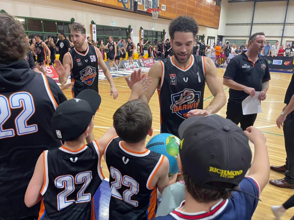 Jarrod Molnar and Tad Dufelmeier greet fans after their 12-point win over North Gold Coast Seahawks. Picture: Ben Thompson.