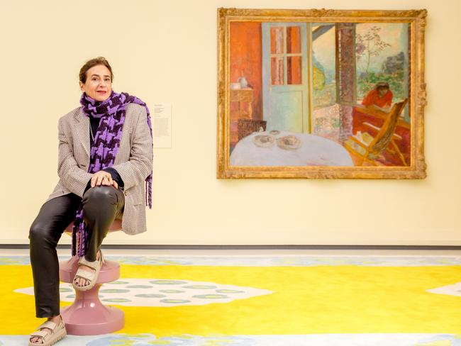 India Mahdavi next to Bonnard’s The dining room in the country in a space she designed and furnished. Picture: Tim Carrafa