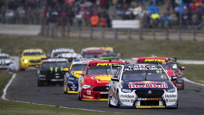 Drivers race around the Symmons Plains circuit during the Tasmanian round of the Supercars championship last year. Picture: MARK HORSBURGH