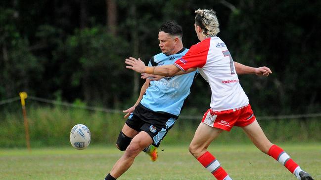 Woolgoolga's Jason McGrady kicking the ball. Picture: Leigh Jensen