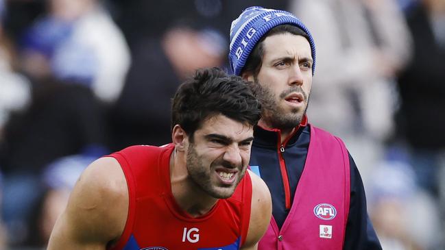 MELBOURNE, AUSTRALIAÃ&#137; June 10, 2024. AFL Round 13. Big Freeze at the G. Collingwood vs Melbourne at the MCG. Christian Petracca of the Demons in pain after copping a Darcy Moore knee in the ribs late in the 1st qtr. . Pic: Michael Klein