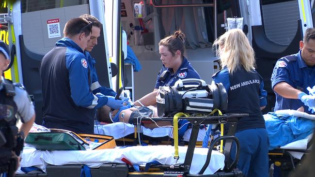 Paramedics with the injured boy who was taken to Sydney Children’s Hospital in a serious condition. Photo: OnScene Bondi / Supplied