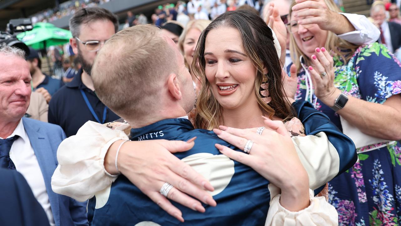 Tommy Berry gets a hug from his wife Sharnee Berry after the race. Picture: Getty Images