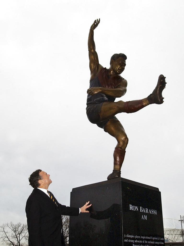 Barassi was immortalised in bronze in a statue at the MCG in 2003. (AAP Image/Joe Castro)