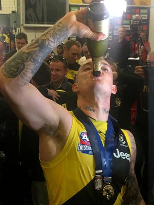 Dustin Martin of the Tigers enjoys the Tigers’ premiership.