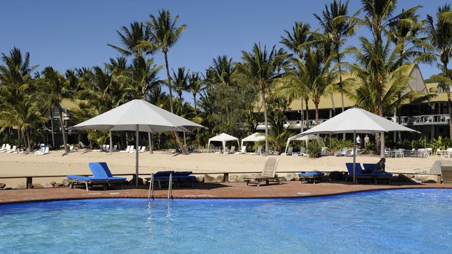 Throwback of the saltwater pool with the Brampton Island resort in the background, before it fell into ruin.