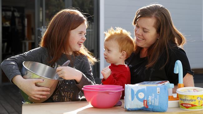 Kelly Lawler with her kids Gemma and Max who have enjoyed baking together during lockdown. Picture: Tim Hunter.