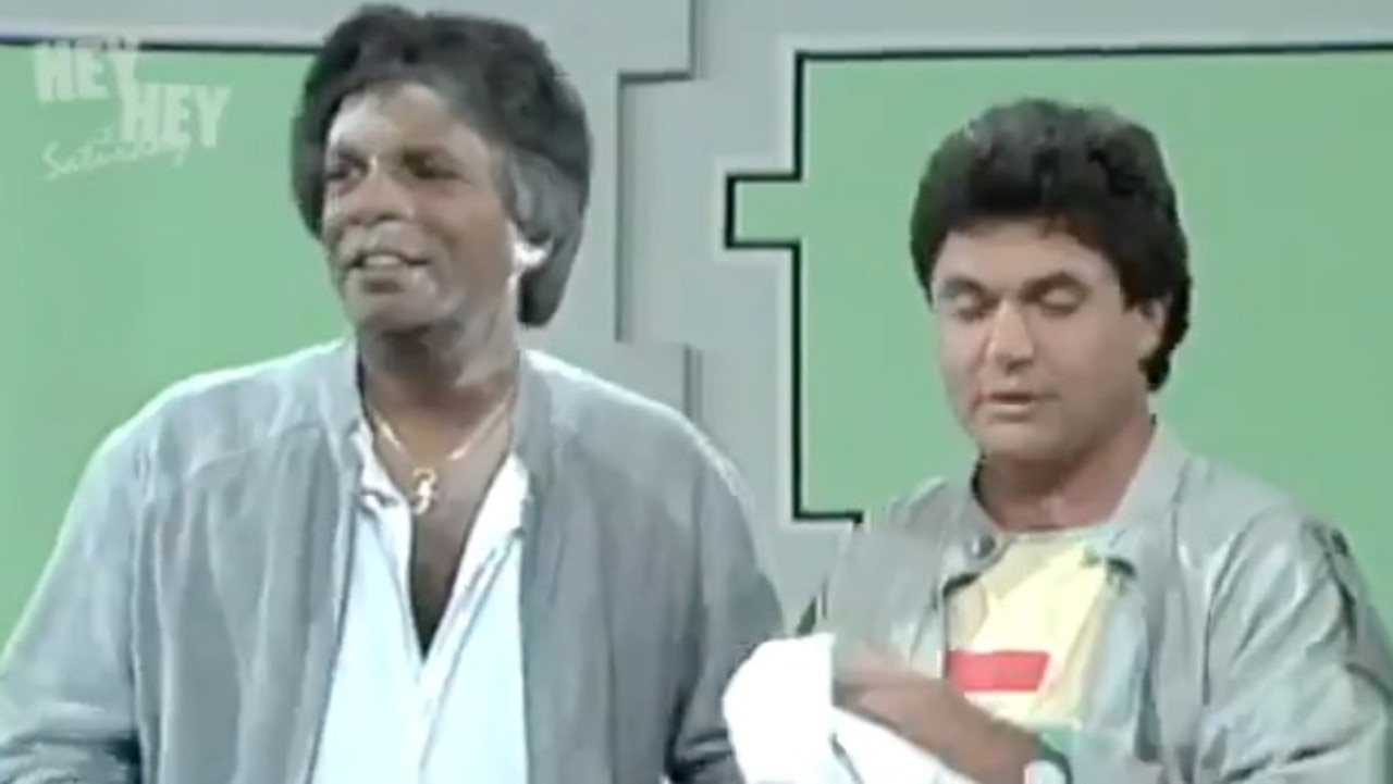 Kamahl and Daryl Somers in 1984 moments after he was hit in the face with white powder.