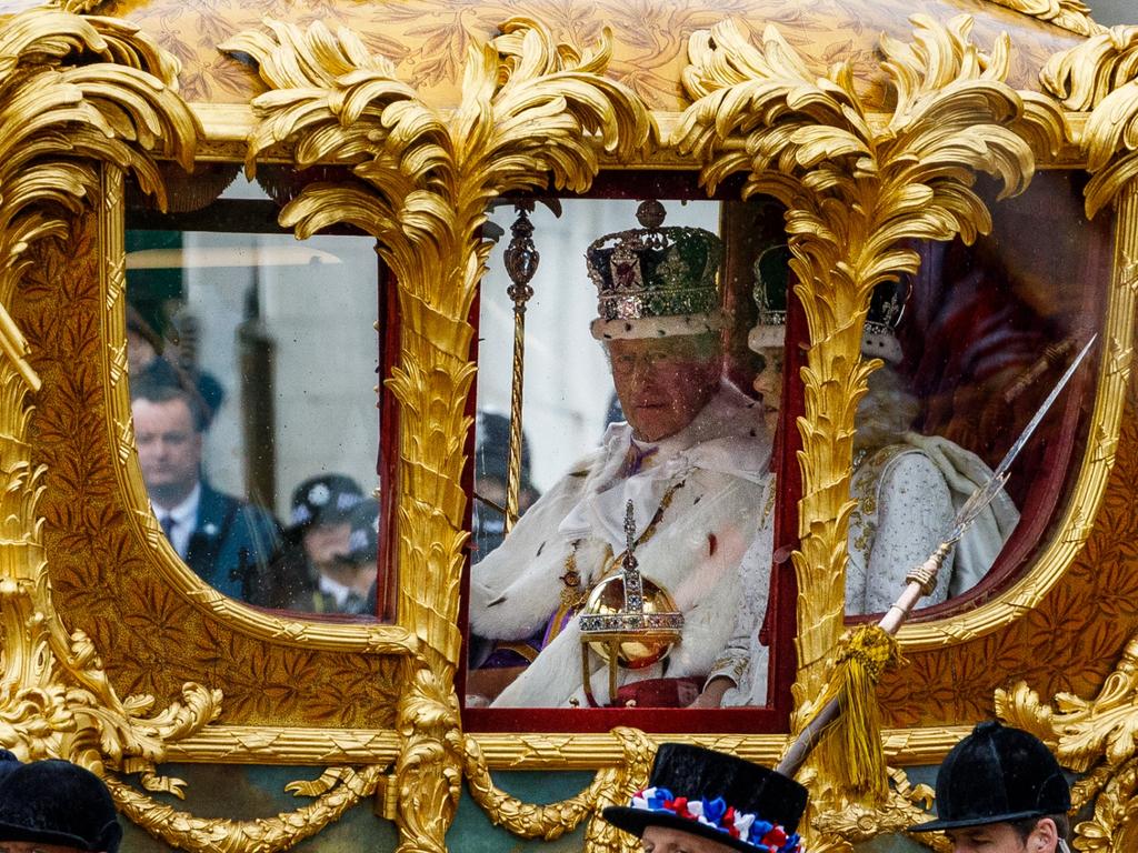 Our new King and Queen looking positively miserable. Picture: Tristan Fewings/Getty Images