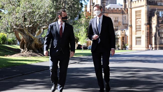 New NSW Premier Dominic Perrottet, right, leaves Government House with his deputy Stuart Ayres after being sworn in on Tuesday. Picture: NCA NewsWire / David Swift