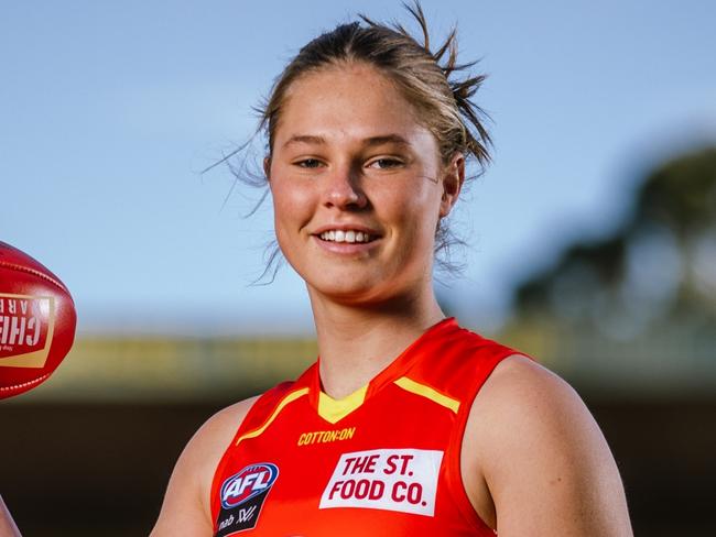 MELBOURNE, AUSTRALIA - JULY 27: Number 1 AFLW draft pick for 2021, Charlie Rowbottom of the Oakleigh Chargers poses for a photograph in her Gold Coast Suns uniform at Glenferrie Oval on July 27, 2021 in Melbourne, Australia. (Photo by Michael Willson/AFL Photos via Getty Images)