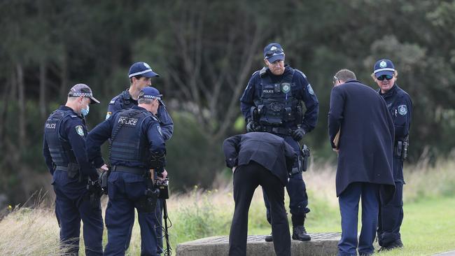 A police strike force has been set up to investigate the death of Stockton man Graham Cameron. Police continue to search the burnt out unit and surrounds looking for evidence. Picture by Peter Lorimer.