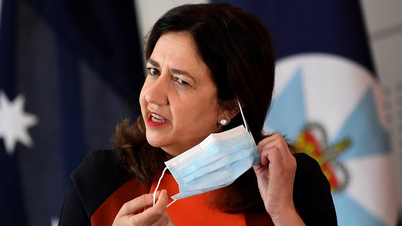 BRISBANE, AUSTRALIA - NewsWire Photos - JANUARY 10, 2021. Queensland Premier Annastacia Palaszczuk takes her mask off before speaking at a press conference to provide a COVID-19 update. Picture: NCA NewsWire / Dan Peled