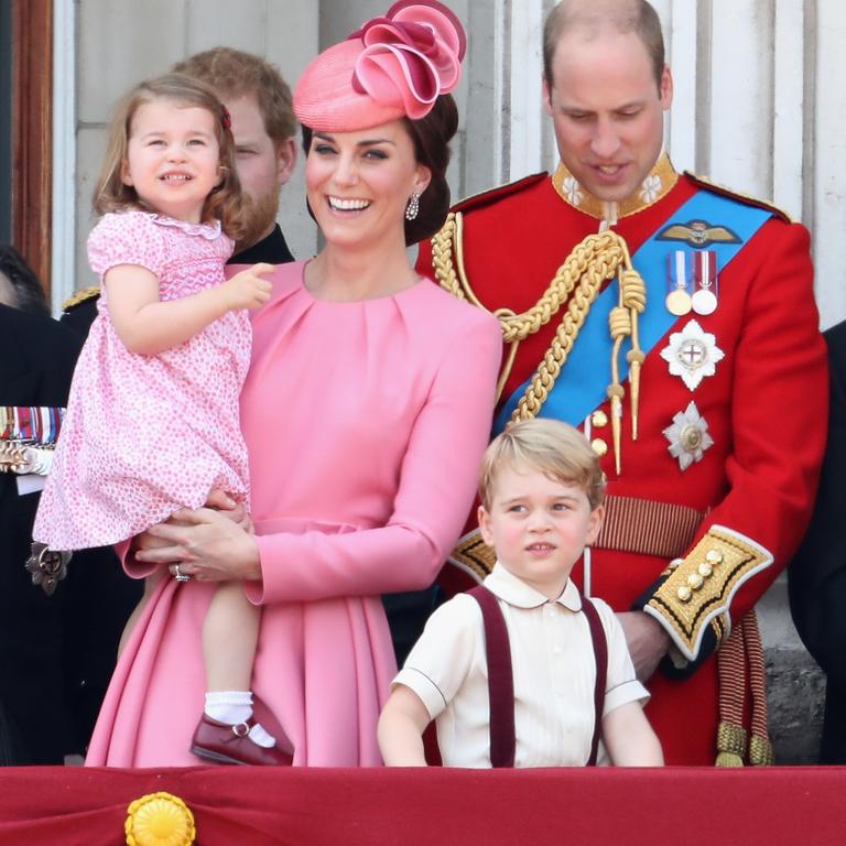 Catherine, Duchess of Cambridge, Princess Charlotte, Prince George and Prince William look out from Buckingham Palace balcony during the Trooping the Colour in 2017. Picture: Chris Jackson/Getty Images