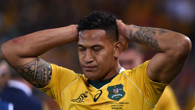 Wallabies player Israel Folau reacts following the First Test between the Australia Wallabies and the England Roses at Suncorp Stadium in Brisbane, Saturday, June 11, 2016. (AAP Image/Dave Hunt) NO ARCHIVING, EDITORIAL USE ONLY