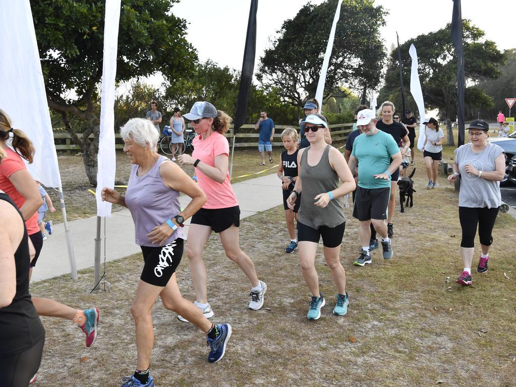 Competitors take off from the Whiting Beach start of the Yamba Triathlon Fun Run on Saturday morning.