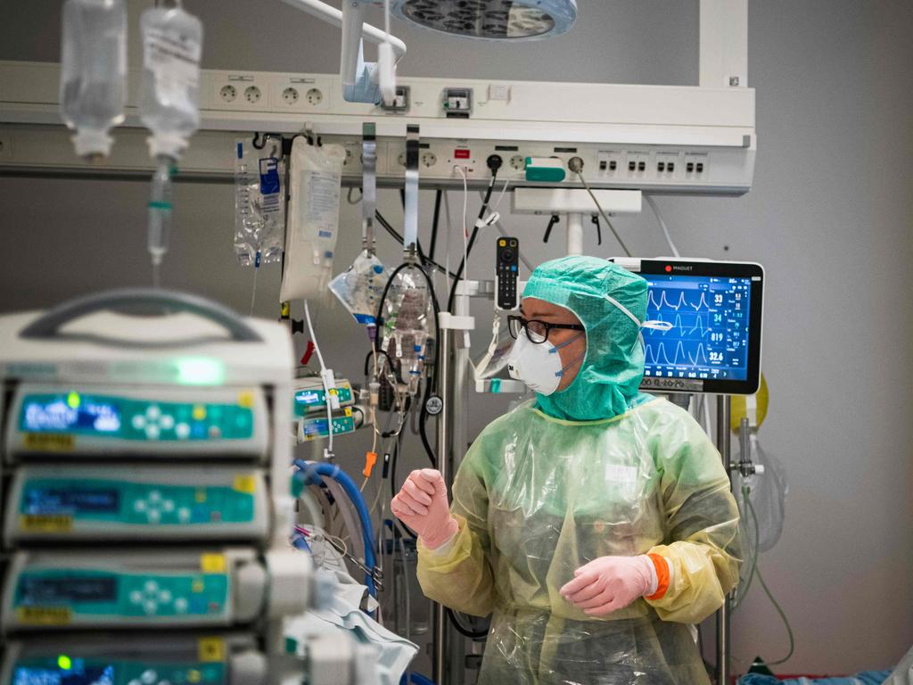 A nurse wearing protective clothing and face mask, takes care of a COVID-19 patient in the Karolinska hospital in Solna, near Stockholm, Sweden. Picture: Jonathan Nackstrand/AFP