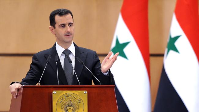 Bashar Assad delivers a speech in Damascus, Syria, June 2011.