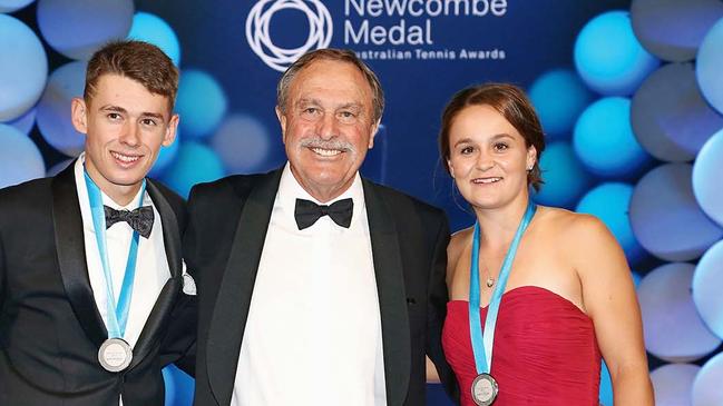 Alex de Minaur and Ashleigh Barty are awarded the Newcombe Medal by John Newcombe on November 26, 2018. Picture: Robert Prezioso/Getty Images