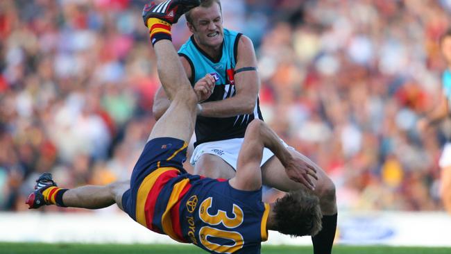 Luke Jericho feels the full force of Power big man Dean Brogan in a collision during Showdown 24 at Football Park in 2008. Picture: Calum Robertson