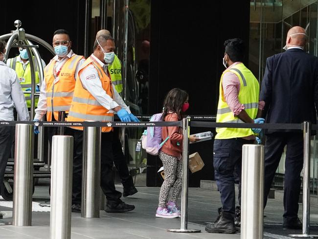 Security guards outside the Crown Promenade Hotel. Picture: AAP