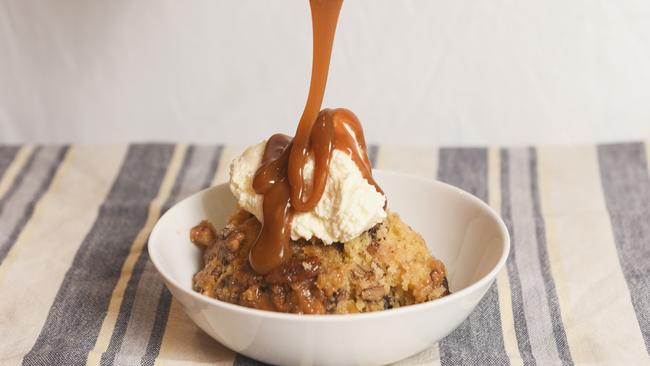 Drizzle on top: Honey and pecan pudding topped with ice cream and salted caramel sauce. Picture: Dannika Bonser