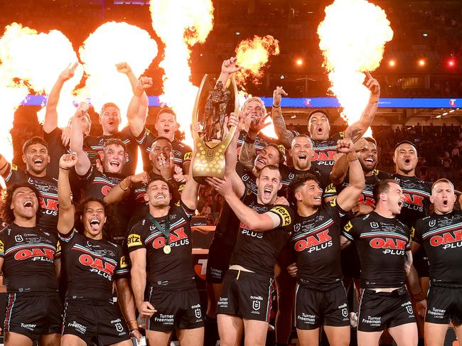 SYDNEY, AUSTRALIA - OCTOBER 01: The Panthers players celebrate victory as the hold up the premiership trophy after the 2023 NRL Grand Final match between Penrith Panthers and Brisbane Broncos at Accor Stadium on October 01, 2023 in Sydney, Australia. (Photo by Bradley Kanaris/Getty Images)