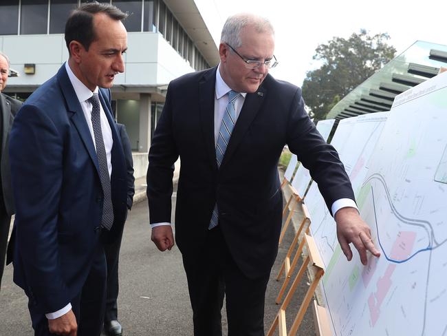 Dave Sharma (left), pictured with PM Scott Morrison, has a fight on his hands to retain his seat at the federal election. Picture: Brett Costello