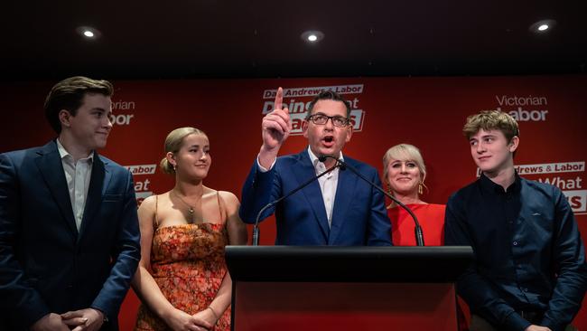 Victorian Premier Daniel Andrews delivers his victory speech as his wife Catherine and children Noah, Grace, and Joseph look on. Picture: Jason Edwards