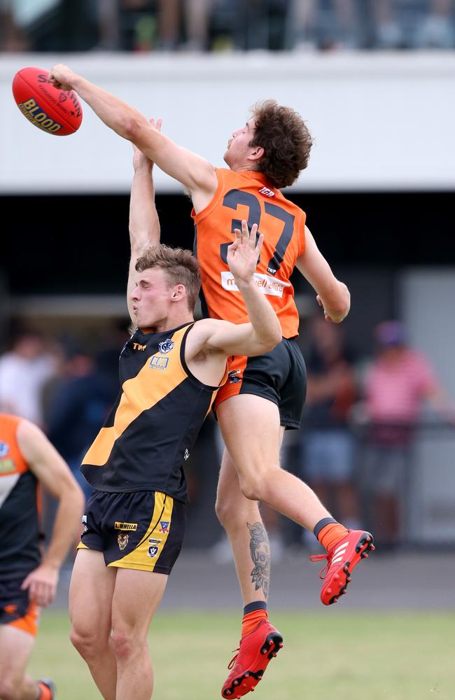 GFL: Geelong West Giants v Grovedale. Geelong West's Josh Dwyer punches the ball away. Picture: Mike Dugdale