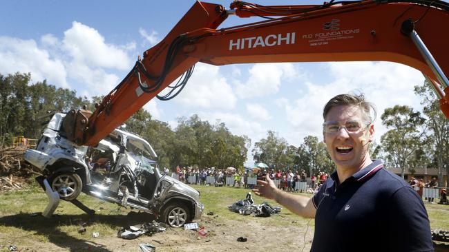 Ashton Wood gets help to destroy his Jeep that was a lemon from the moment he drove it out of the dealer ship. Bli Bli. Pic Megan Slade