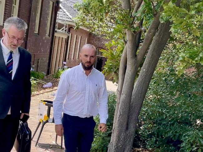 Javien Wallace (right) leaving Hornsby Local Court