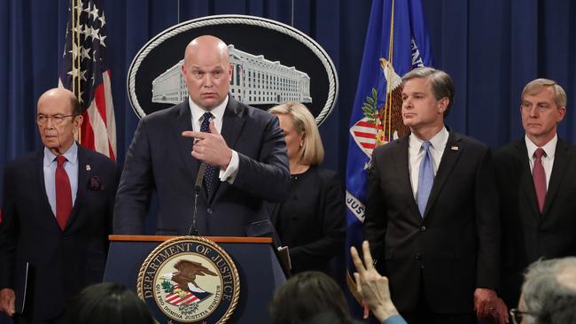 WASHINGTON, DC - JANUARY 28: (L-R) U.S. Commerce Secretary Wilbur Ross, acting Attorney General Matthew Whitaker, Homeland Security Secretary Kirstjen Nielsen, Federal Bureau of Investigation Director Christopher Wray and U.S. Attorney Richard Donoghue of the Eastern District of New York announce new criminal charges against Chinese telecommunications giant Huawei at the Department of Justice January 28, 2019 in Washington, DC. The Justice Department is charging Huawei and its American affiliate with theft of trade secrets, wire fraud, and obstruction of justice. The recent arrest of Huawei CFO Meng Wanzhou in Canada has strained relations between the United States and China as the Trump administration seeks to have her extradited to the U.S.   Chip Somodevilla/Getty Images/AFP == FOR NEWSPAPERS, INTERNET, TELCOS & TELEVISION USE ONLY ==