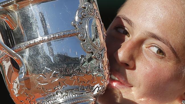 Latvia's Jelena Ostapenko kisses the cup after defeating Romania's Simona Halep.  Picture:  AP