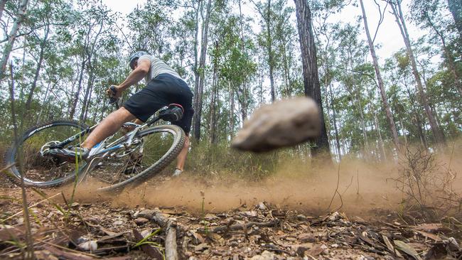 COPYRIGHT WARNING for Moreton Life ONLY. Phone Kylie Knight 3480 8226. Dirt bike action in Bunyaville conservation park. For hinterland adventures story.