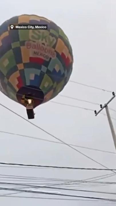 Hot air balloons forced to crash land in city