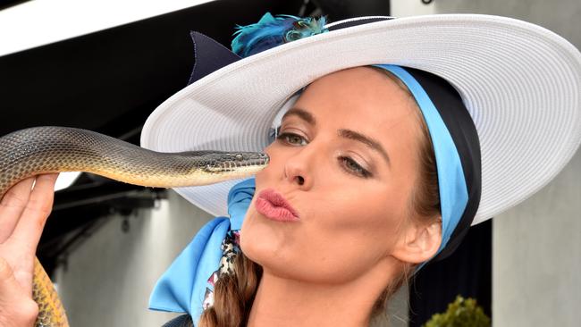 Robyn Lawley with Wanda the Water Python in the Kennedy Marquee. Picture: Jay Town