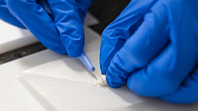 A chemical analyst runs a test at CanTEST Health and Drug Checking Service in Canberra. Picture: Martin Ollman